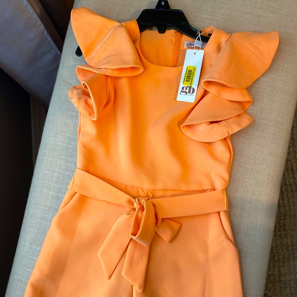 New with tags GB girls romper. Waited too long to return it to Dillards!
